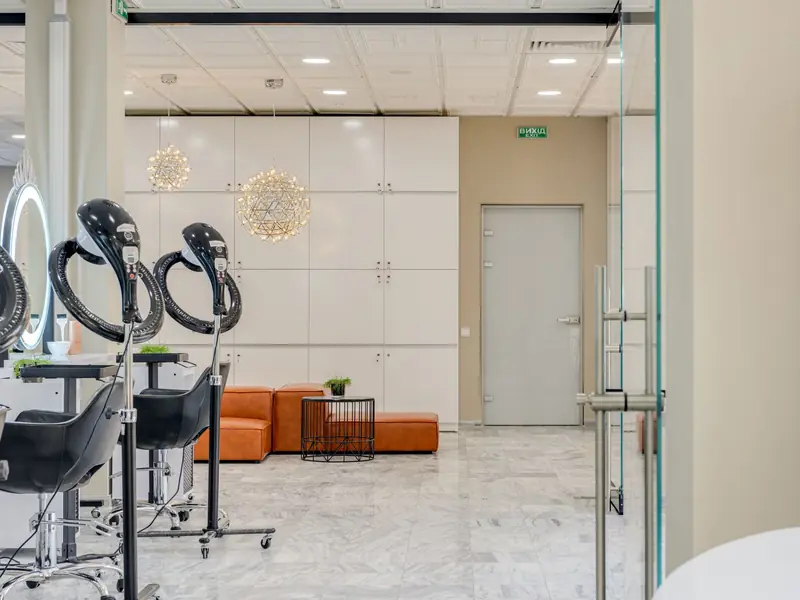 Cozy beauty salon with styling stations