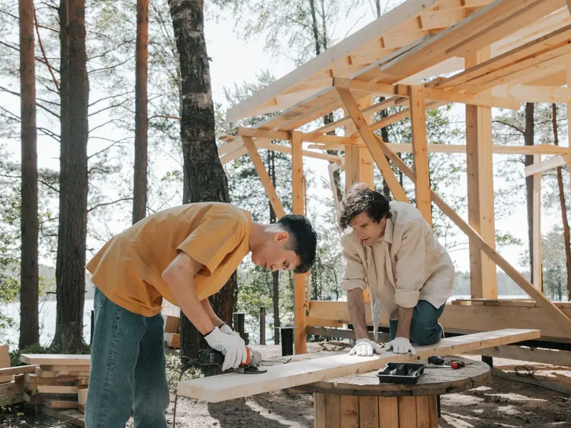 Carpenters working on a timber frame