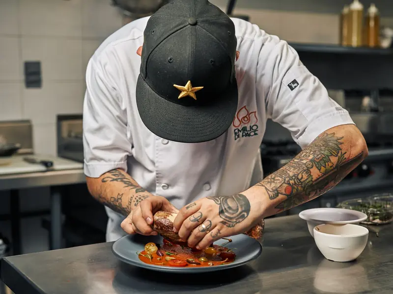 Chef plating a dish