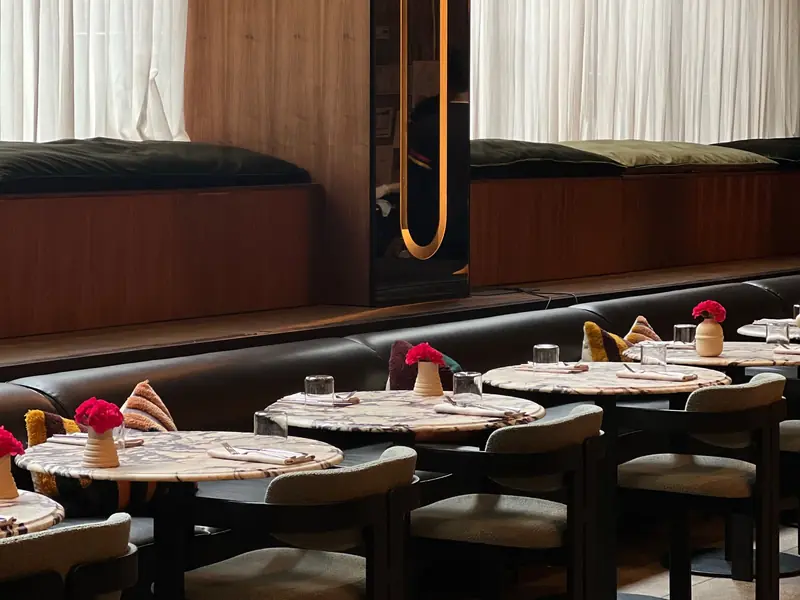 Restaurant dining room with set tables