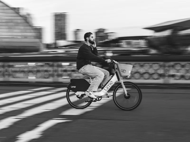 E-bike rider in motion on a city street