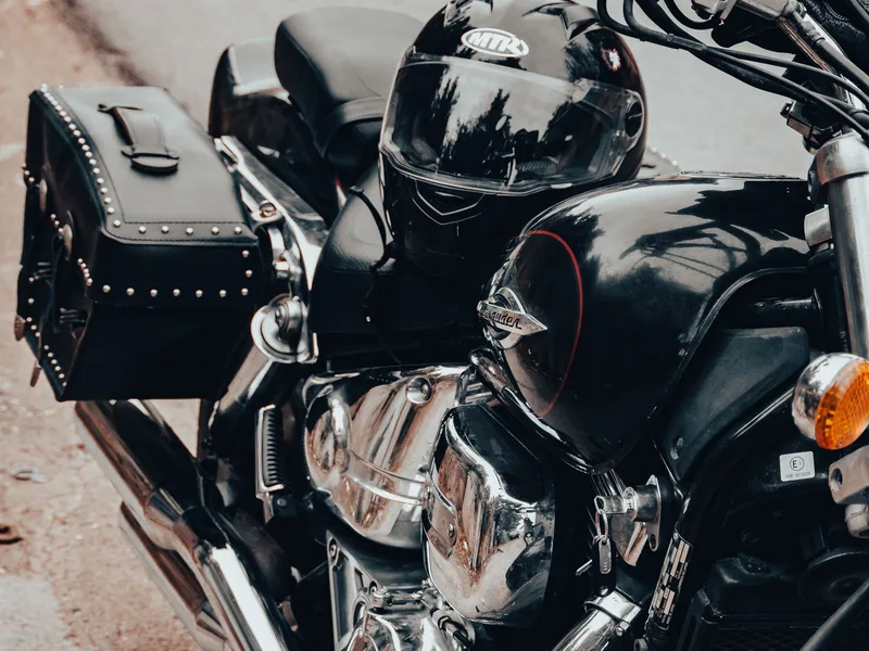 Cruiser with leather saddlebags and helmet